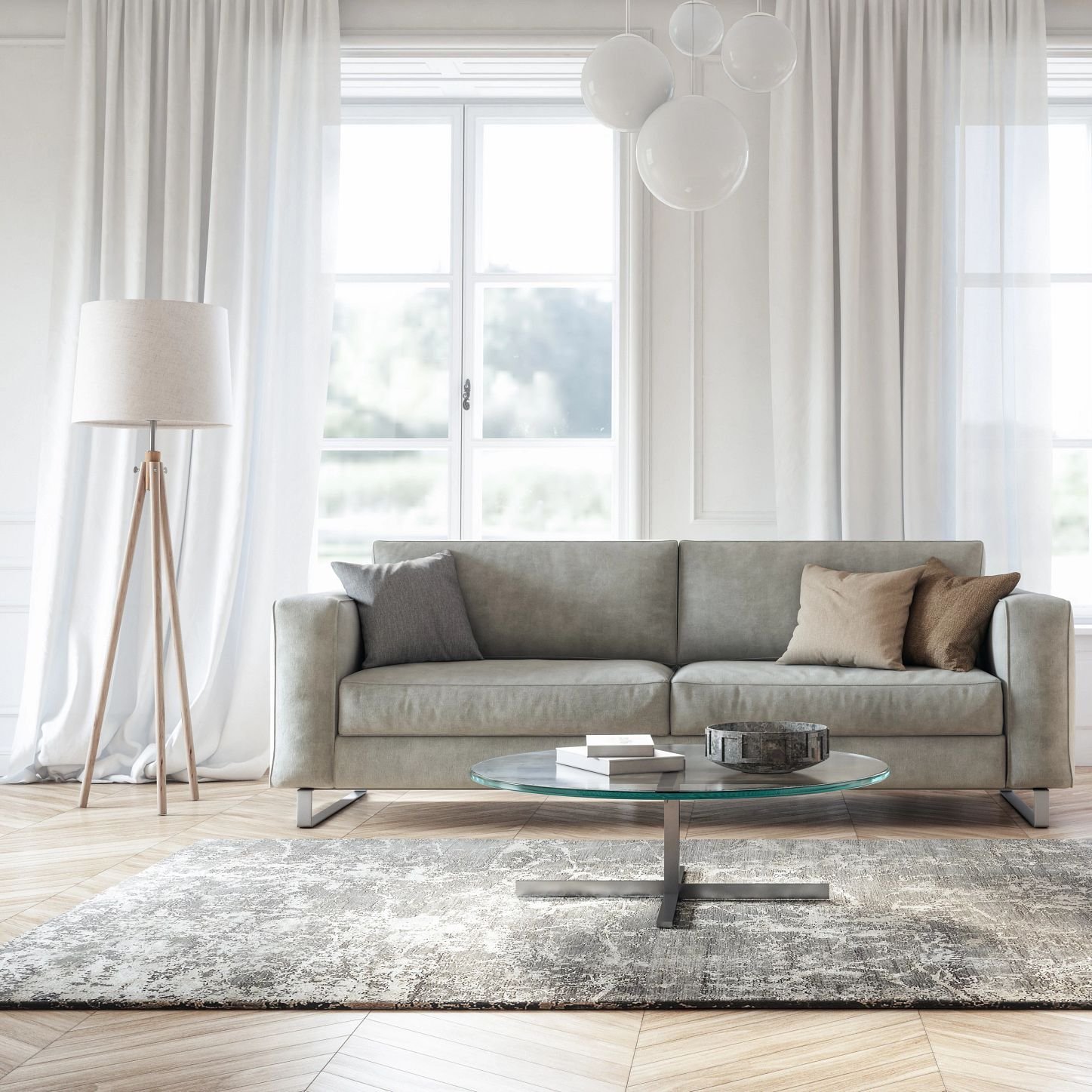 Bright living room with light hardwood flooring and a large gray area rug from Wholesale Flooring and Blinds in Casper, WY