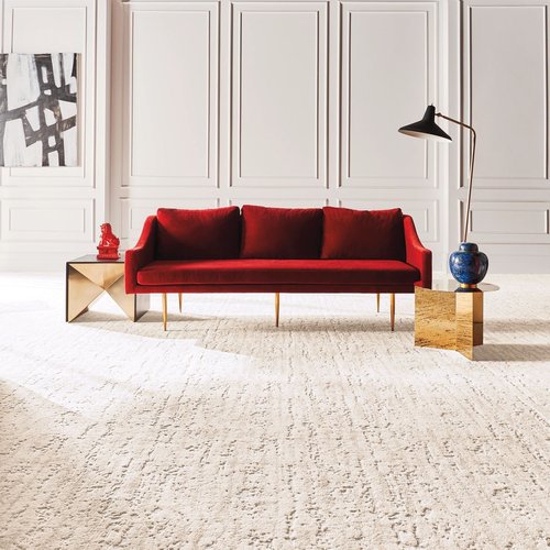 red sofa on beige carpet from Wholesale Flooring and Blinds in Casper, WY